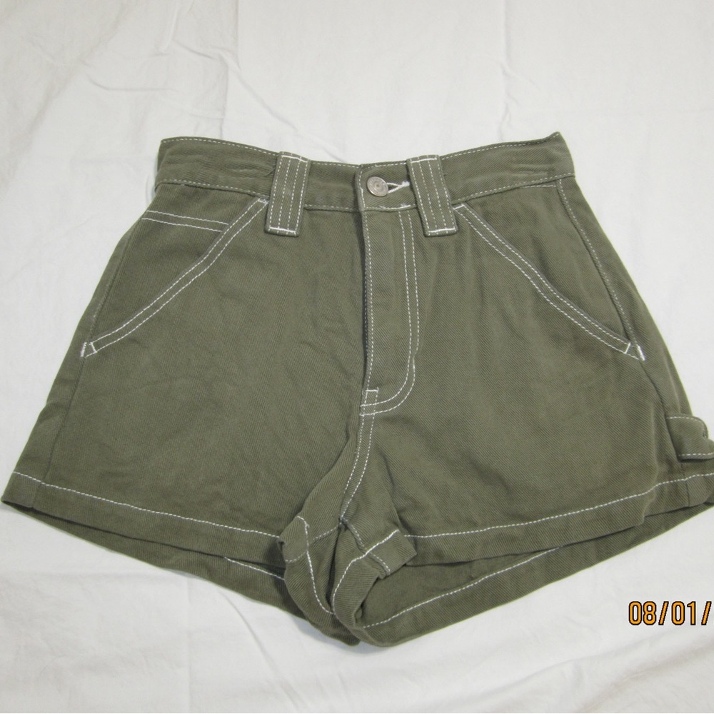 Green cargo shorts from Pacsun with white stitching size 23!